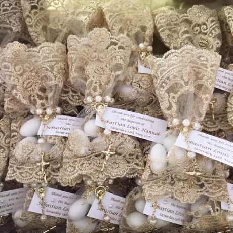 Gold lace bonbonniere bags with mini rosary bead Gold lace bonbonniere bags with mini rosary bead