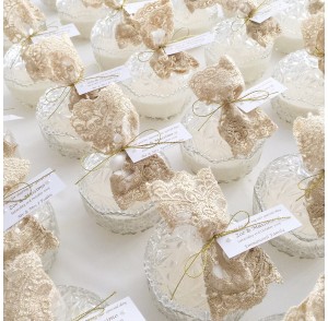 Decorative candle trinket with gold lace bag bonbonniere