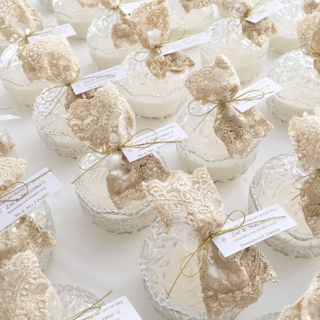 Decorative candle trinket with gold lace bag bonbonniere