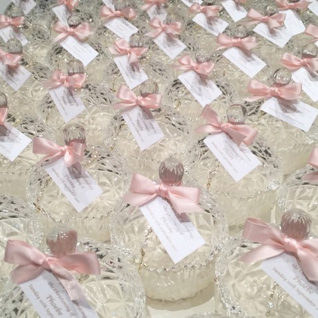 Decorative candle trinket with mini rosary bead